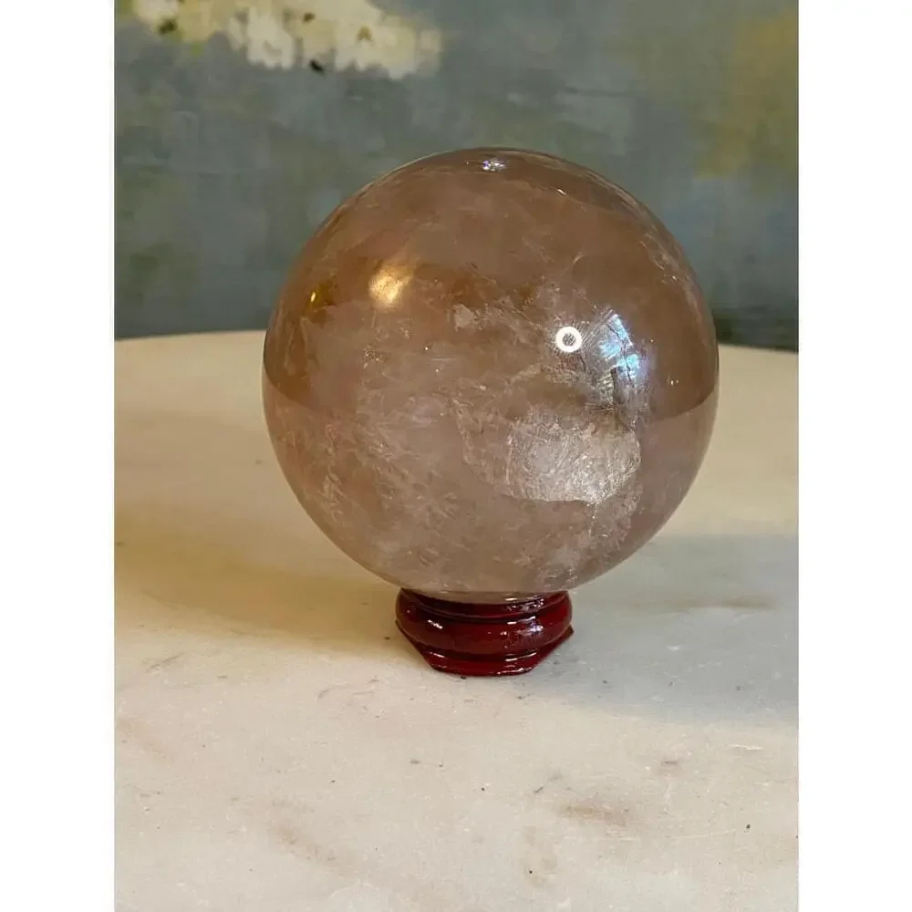 Large hematoid fire quartz sphere